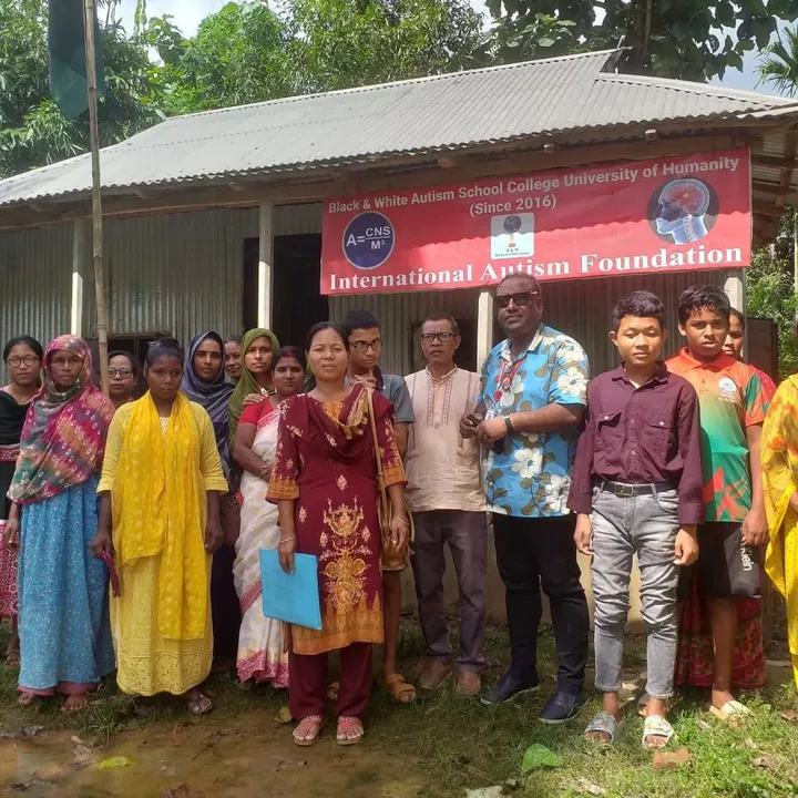 Families gathered in front of the school building